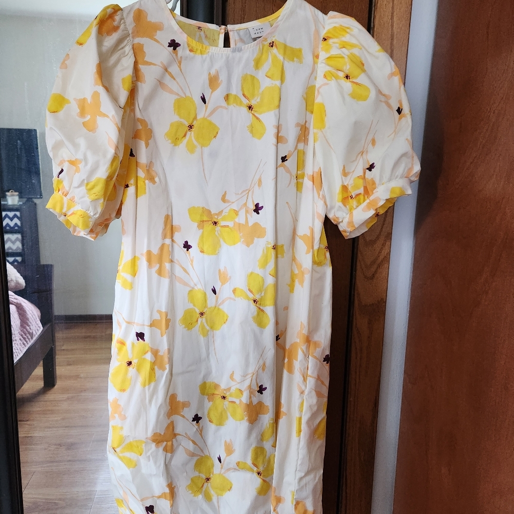 White and yellow floral dress